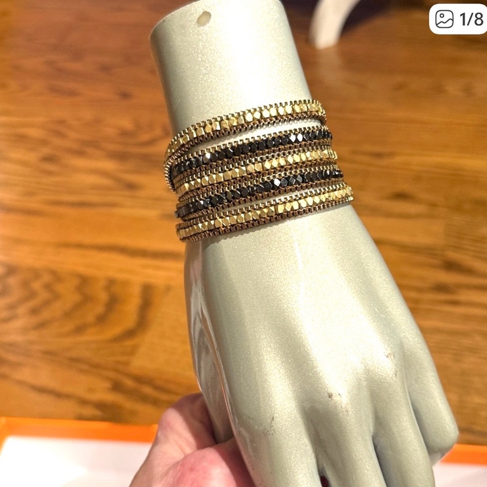 Elegant Gold metal and Black/grey metal Bracelet